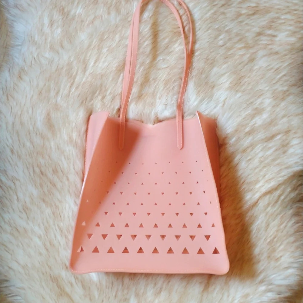Neiman Marcus Peach Lazer Cutout Rubber Jelly Bag By Eddie Borgo